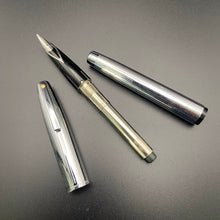 Load image into Gallery viewer, Sheaffer Triumph 506 Bright Chrome vintage fountain pen. 1970s.