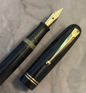 Swan celluloid in a midnight blue colour.