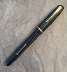 Swan celluloid in a midnight blue colour.