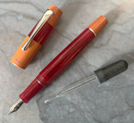 Opus 88 KOLORO Red translucent plastic, and Ebonite