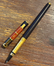 Load image into Gallery viewer, Yves St Laurent vintage Rollerball. Deep purple &amp; Terracotta