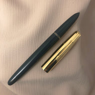 Hero 616, Gilded Gold cap, Teal